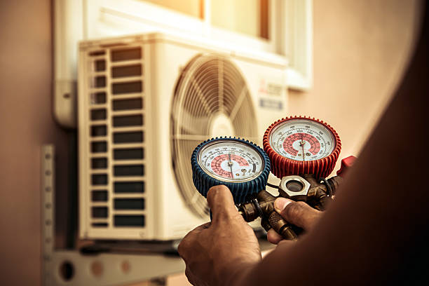 Professional Heat Pump Repair technician working in Loves Park, IL
